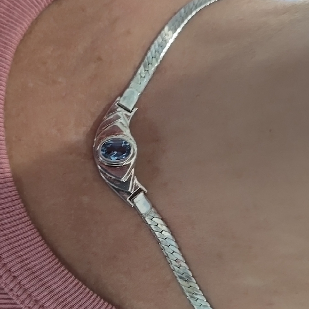 Sleek Silver Necklace with Blue Gemstone Accent
